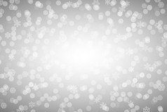 圣诞节银闪亮的背景与雪花和镜头耀斑圣诞节银闪亮的背景与雪花和镜头