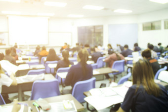 模糊背景<strong>大学</strong>学生做小测验测试研究从的老师大讲座房间学生统一的参加<strong>考试</strong>教室教育学校