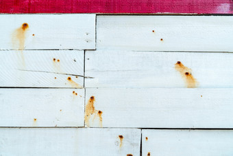白色木墙纹理背景木板材表面纹理背景木材木墙纹理背景外设计的橙色颜色生锈的指甲污渍白色木墙