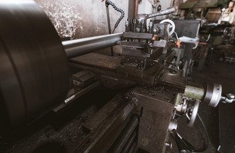 车床机工作工厂车床把机为金属制品重机械制造业机为铣金属背景为安全工业工作场所概念钢行业