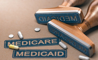 插图两个橡胶邮票与的单词美琪儿和医疗补助计划在纸背景医疗保险和医疗补助计划国家健康保险程序的曼联州