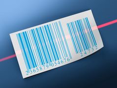 barcodes贴纸和激光梁在黑暗蓝色的背景