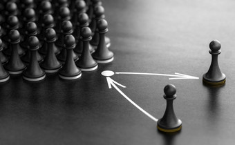 插图棋子在黑色的背景与一个一块取代另一个一个概念继承规划和领袖高级经理更换继承规划人才领袖更换计划