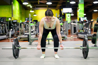 运动女人锻炼死角举升健身房高质量照片运动女人锻炼死角举升健身房