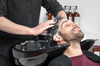 理发师商店理发师男人。洗客户端头理发店高质量摄影理发师商店理发师男人。洗客户端头理发店