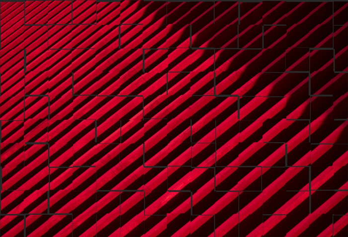 摘要背景设计对角红色的和黑色的条纹墙瓷砖模式风格未完成的布局红色的和黑色的墙瓷砖模式为背景设计概念插图模式