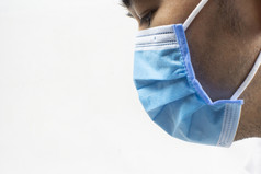 亚洲但穿外科手术面具为保护脸对冠状病毒与复制空间新冠病毒