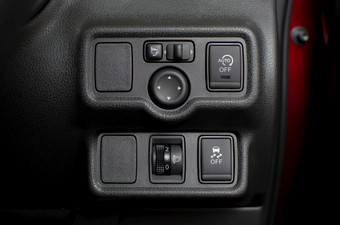 按钮面板车与头灯水平开关和牵引控制和空转停止和翼镜子控制开关汽车部分概念