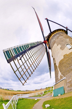 小孩堤防传统的荷兰风车泵水联合国教科文组织世界遗产荷兰荷兰欧洲