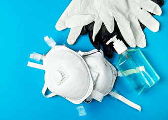 呼吸保护呼吸器和乳胶手套防腐剂过来这里个人保护设备提供保护对的传播感染前视图明亮的蓝色的背景