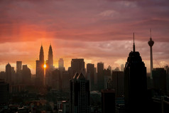 轮廓拍摄市中心(泥城市天际线城市景观马来西亚日落