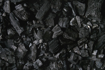 黑色的木炭纹理摘要表面背景前视图黑色的木炭背景