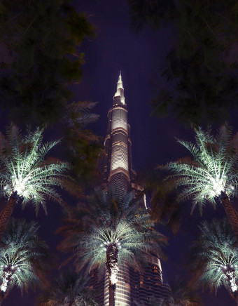 迪拜阿联酋12月迪拜阿联酋12月urbanistic背景假期阿联酋晚上背景未来主义的天际线曼联阿拉伯阿联酋航空公司晚上天空著名的具有里程碑意义的