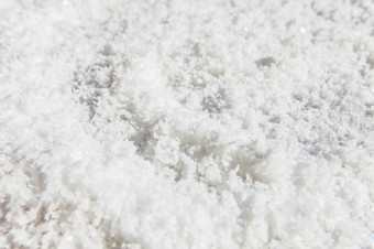 纯白色晶体盐岩石盐的地面前视图关闭传统的岩石盐使kluea南泰国古老的盐坑盐文化历史盐完整的框架明亮的阳光