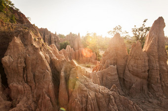 金太阳照下来周围的为什么你我们网站显示风景如画的风景侵蚀砂岩柱子古老的风景优美的景观类似的峡谷神奇的列和悬崖纹理温暖的语气南泰国