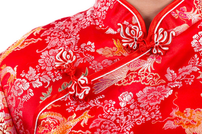 中国人女人红色的衣服传统的旗袍关闭肖像统一的中国人新一年