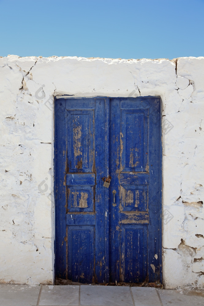 的老墙而且蓝色的木门aio圣托里尼岛锡拉基克拉迪群岛岛屿爱琴海海希腊欧洲建筑细节老房子aio圣托里尼岛锡拉基克拉迪群岛岛屿爱琴海海希腊欧洲