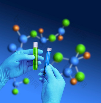 化学家手持有测试管分子模型背景测试管分子模型