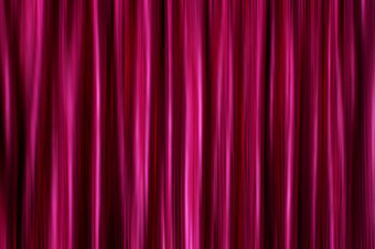 紫色的柔滑的缎窗帘布料背景紫色的柔滑的缎窗帘