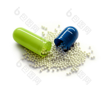 <strong>绿色</strong>蓝色的医学荚膜打开包含细粒度的药物医学荚膜细粒度的