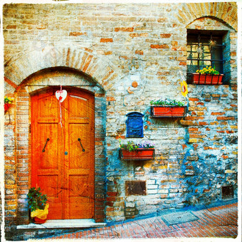 迷人的老中世纪的村庄意大利与典型的花狭窄的街道斯佩洛Umbria<strong>图片复古</strong>的风格