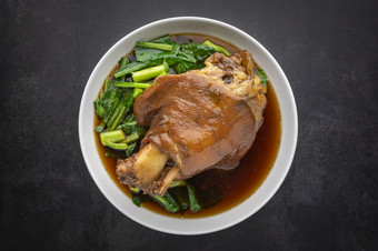 呵呵MOO泰国食物棕色（的）中国人红烧猪肉腿甜蜜的棕色（的）酱汁黑暗语气纹理背景前视图拍摄