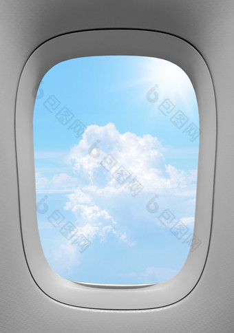 特写镜头的飞机窗口与的云天空背景