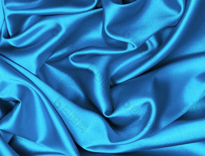 光滑的优雅的黑暗蓝色的丝绸背景光滑的优雅的黑暗蓝色的丝绸