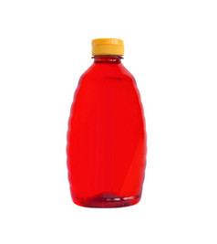 红色的塑料瓶与洗发水白色背景