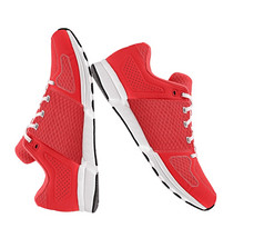红色的女人的体育运动鞋子孤立的白色背景红色的女人的体育运动鞋子