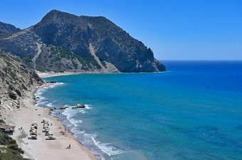 美丽的海滩与海旅游度假胜地希腊岛食物美丽的概念为夏天假期自然色彩斑斓的背景
