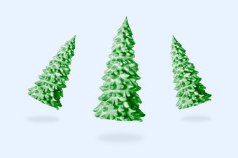悬浮绿色圣诞节树在蓝色的背景<strong>新</strong>一年rsquo<strong>简约</strong>概念
