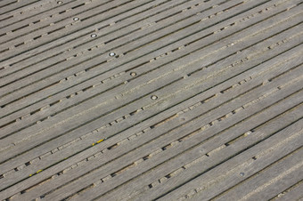 背景装饰使老螺栓木压条仍然是老水泥之间的的板条背景与木板条和水泥