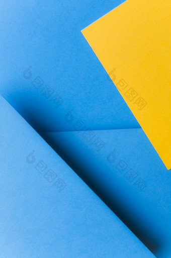 颜色两个语气蓝色的黄色的纸背景美丽的照片颜色两个语气蓝色的黄色的纸背景
