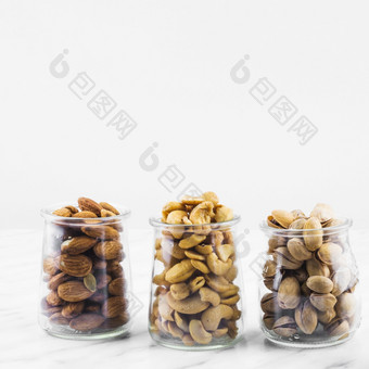 杏仁cashewnuts<strong>开心</strong>果大理石背景高决议照片杏仁cashewnuts<strong>开心</strong>果大理石背景高质量照片