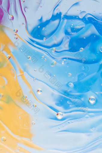 液体效果蓝色的黄色的画背景高决议照片液体效果蓝色的黄色的画背景高质量照片