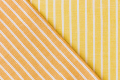 黄色的橙色织物衣服背景高决议照片黄色的橙色织物衣服背景高质量照片