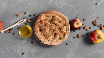 前视图馅饼与蜂蜜苹果高决议照片前视图馅饼与蜂蜜苹果高质量照片