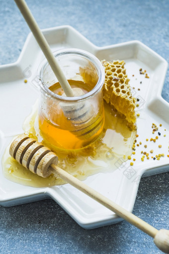 蜂蜜能与蜂蜜七星蜂蜜梳子花托盘
