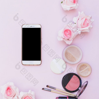 <strong>手机</strong>化妆品产品花粉红色的背景粉红色的背景