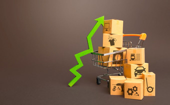 购物车与盒子和绿色箭头增长贸易生产增加销售率改善消费者情绪高需求为货物零售商品兴奋货币兑换不断上升的价格