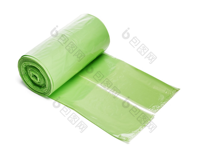 卷绿色塑料垃圾袋孤立的白色与naturan影子