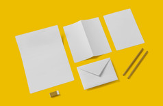 白色空文具模拟添加你的设计简单的回来学校概念孤立的黄色的