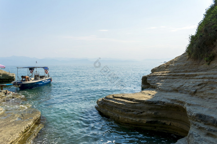 科孚岛岛希腊月岩石海滩科孚岛岛希腊岩石海图片