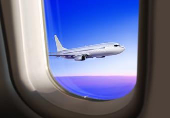 商业飞机苍蝇的天空视图从的窗口飞机