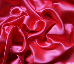 光滑的优雅的红色的丝绸可以使用背景
