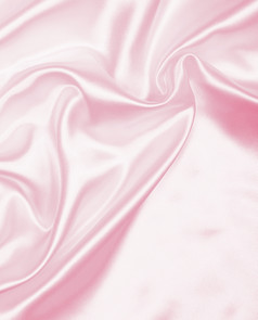 光滑的优雅的粉红色的丝绸可以使用婚礼背景