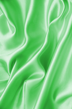 光滑的优雅的绿色丝绸可以使用背景