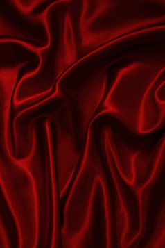 光滑的优雅的红色的丝绸可以使用背景