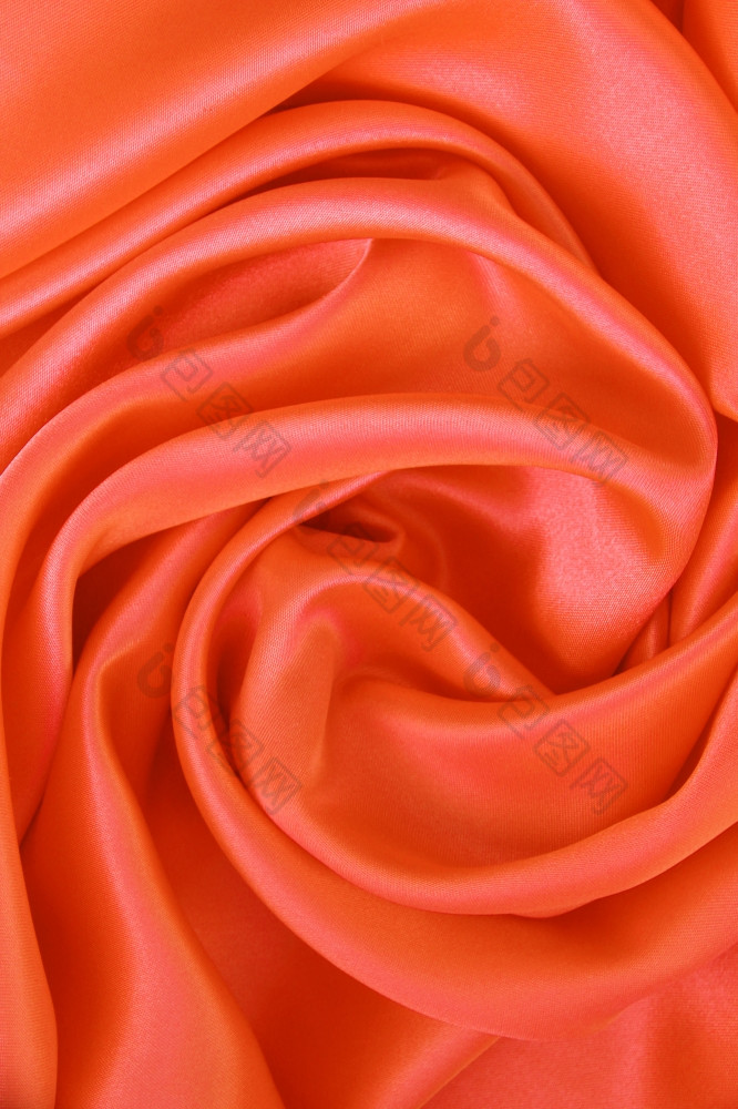光滑的优雅的橙色丝绸缎可以使用背景